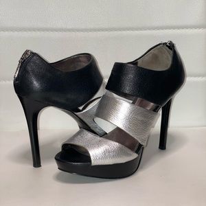 Calvin Klein black and silver platform pumps size 6.5